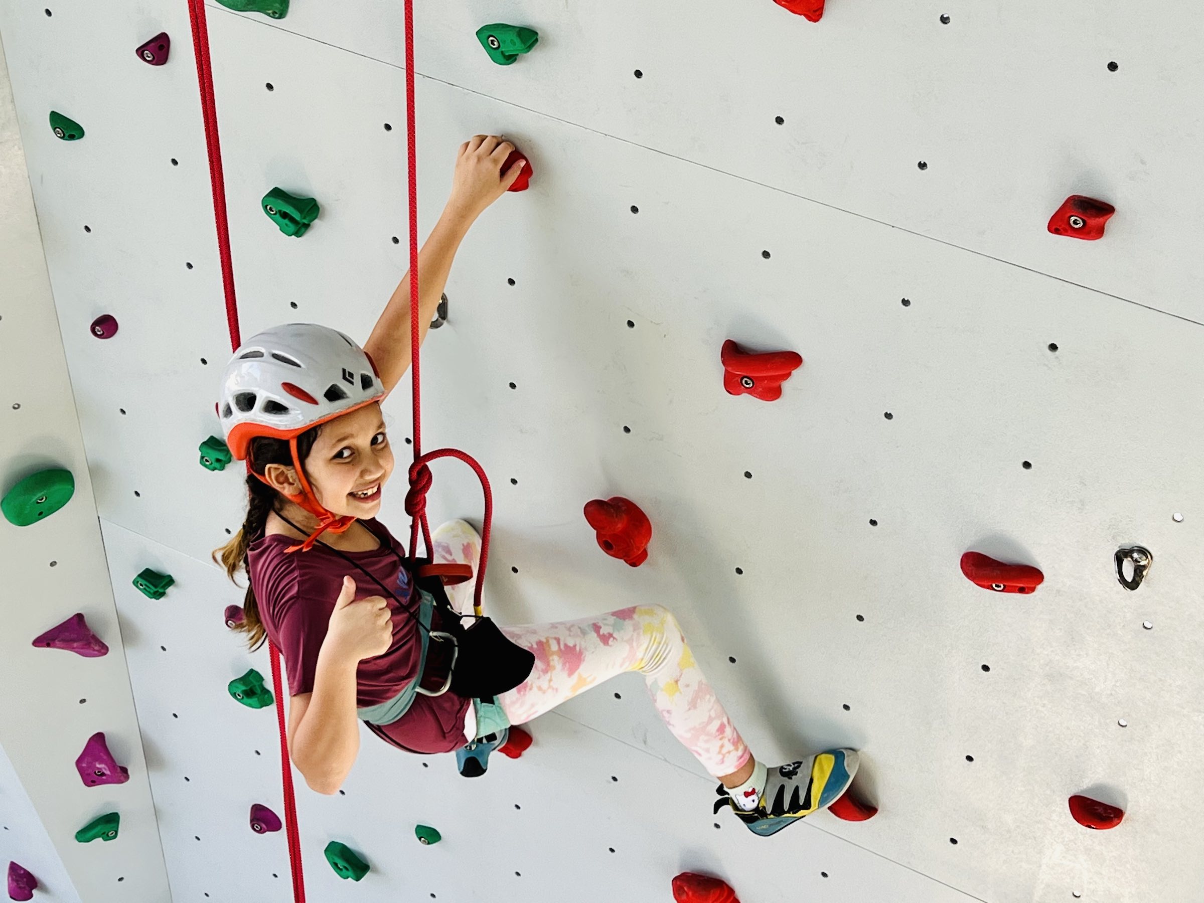 Youth enjoying climbing at Progression Climbing and Vertical Sports Center in Chiang Mai Thailand